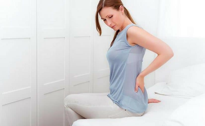 هل ألم أسفل الظهر من علامات الحمل بولد  ؟