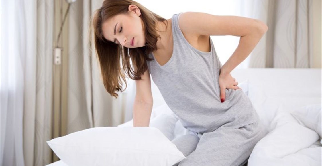 هل ألم أسفل الظهر من علامات الحمل قبل الدورة؟